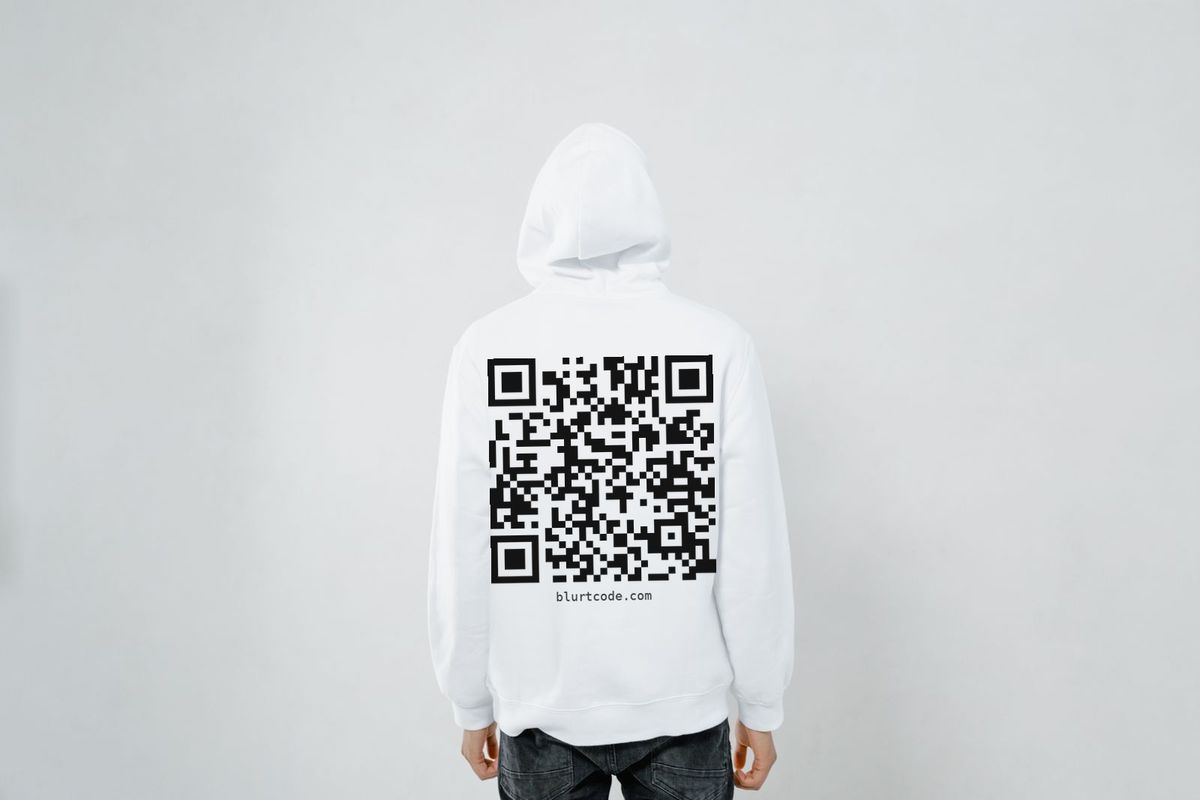 White hoodie, worn, with a large QR code on the back