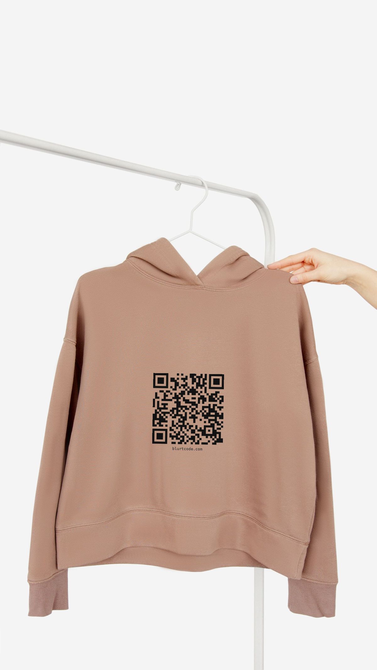 Tan hoodie on a rack with a chest QR code