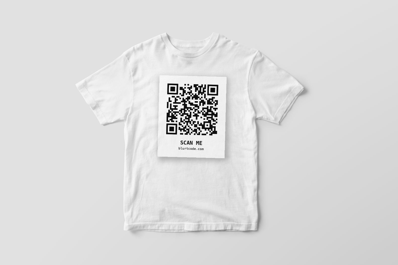 White t-shirt with a printed Blurtcode QR code on the chest